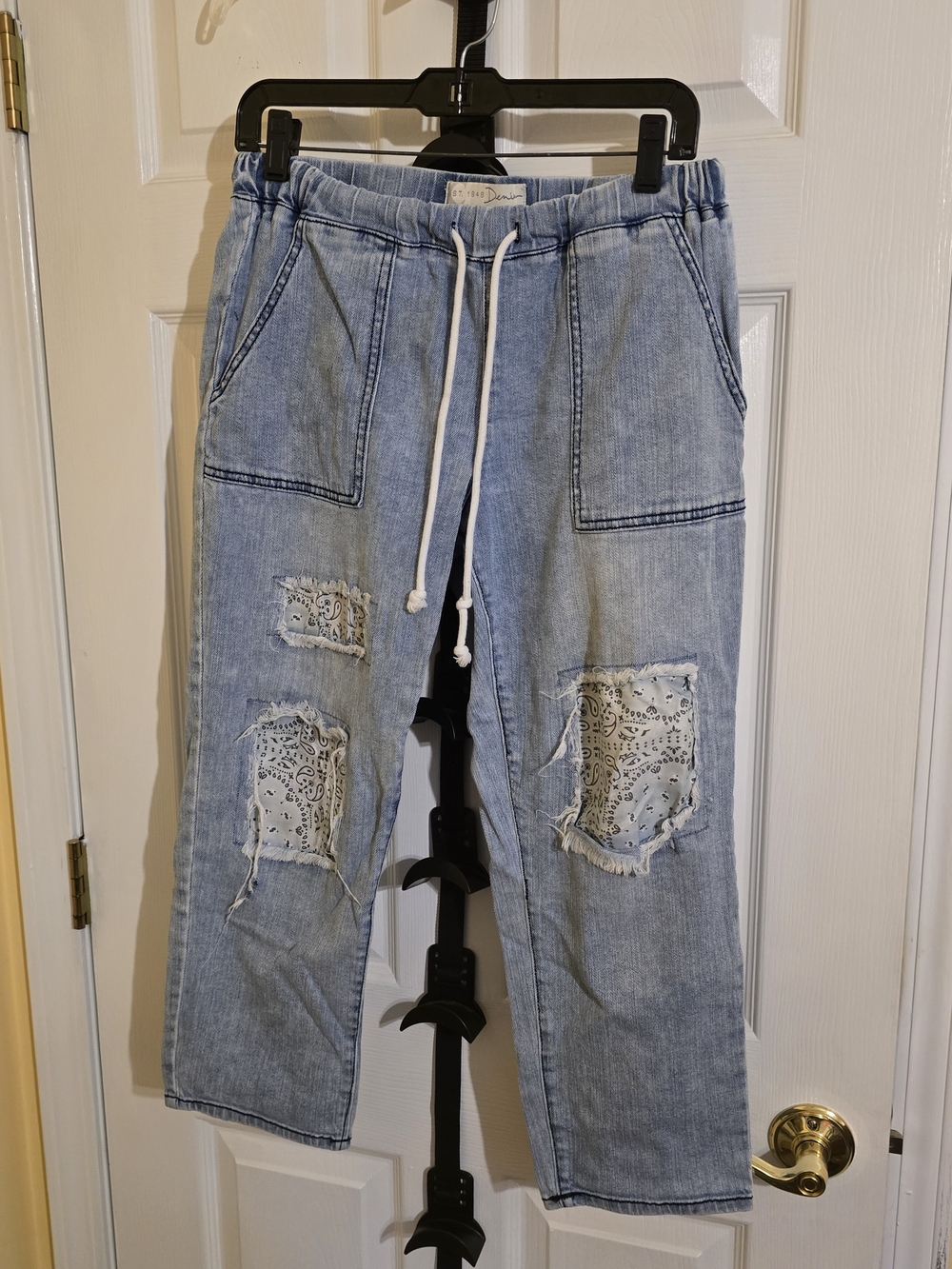 Light Blue Women's Boyfriend Jeans with Drawstring and Patch Details